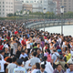 Visitors throng the Bund, Shanghai's iconic waterfront, on the second day of the National Day "Golden Week" holiday, in China October 2, 2018. Picture taken October 2, 2018. REUTERS/Stringer ATTENTION EDITORS - THIS IMAGE WAS PROVIDED BY A THIRD PARTY. CHINA OUT. - RC1DA6A14670